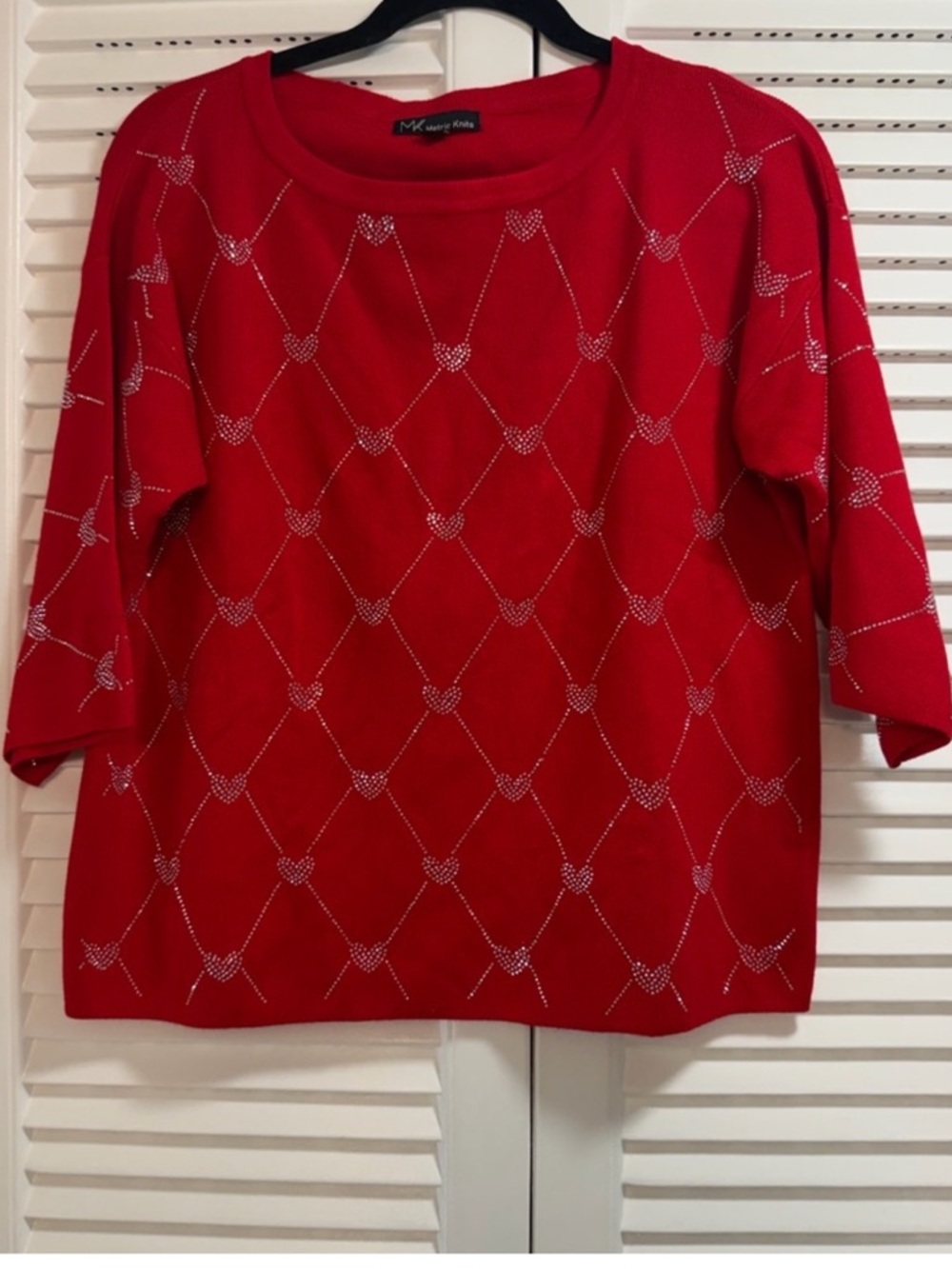Elegant Red 3/4 Sleeve knit Top with Rhinestoned Hearts.